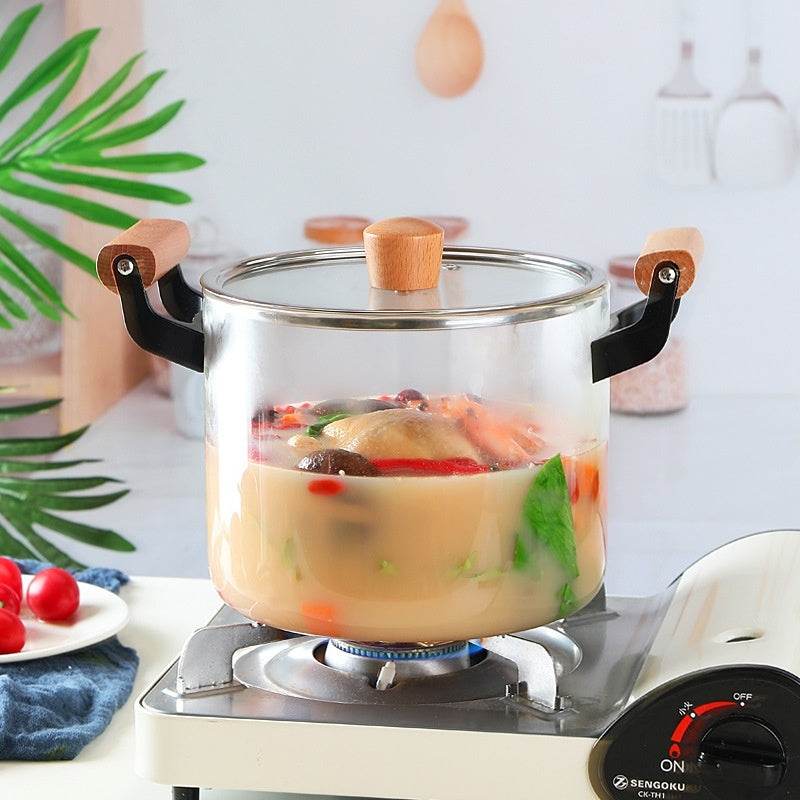 Borosilicate Visions Cookware Pot with Binaural Glass and Wooden Handles on Stove