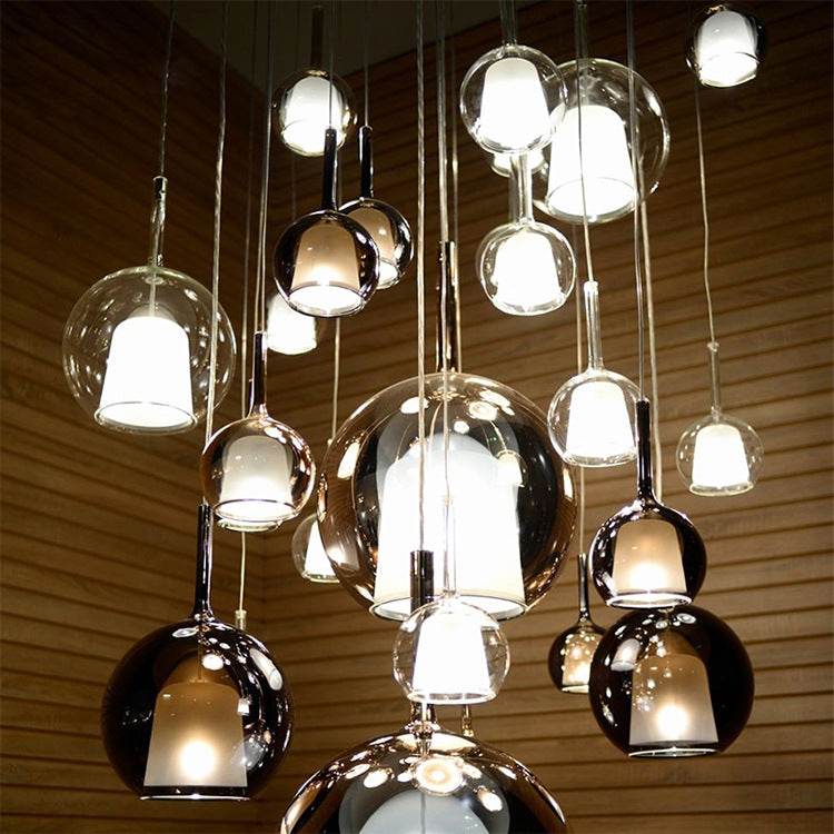 Nordic creative staircase chandelier with transparent and amber glass orbs, 220V, stylish lighting.