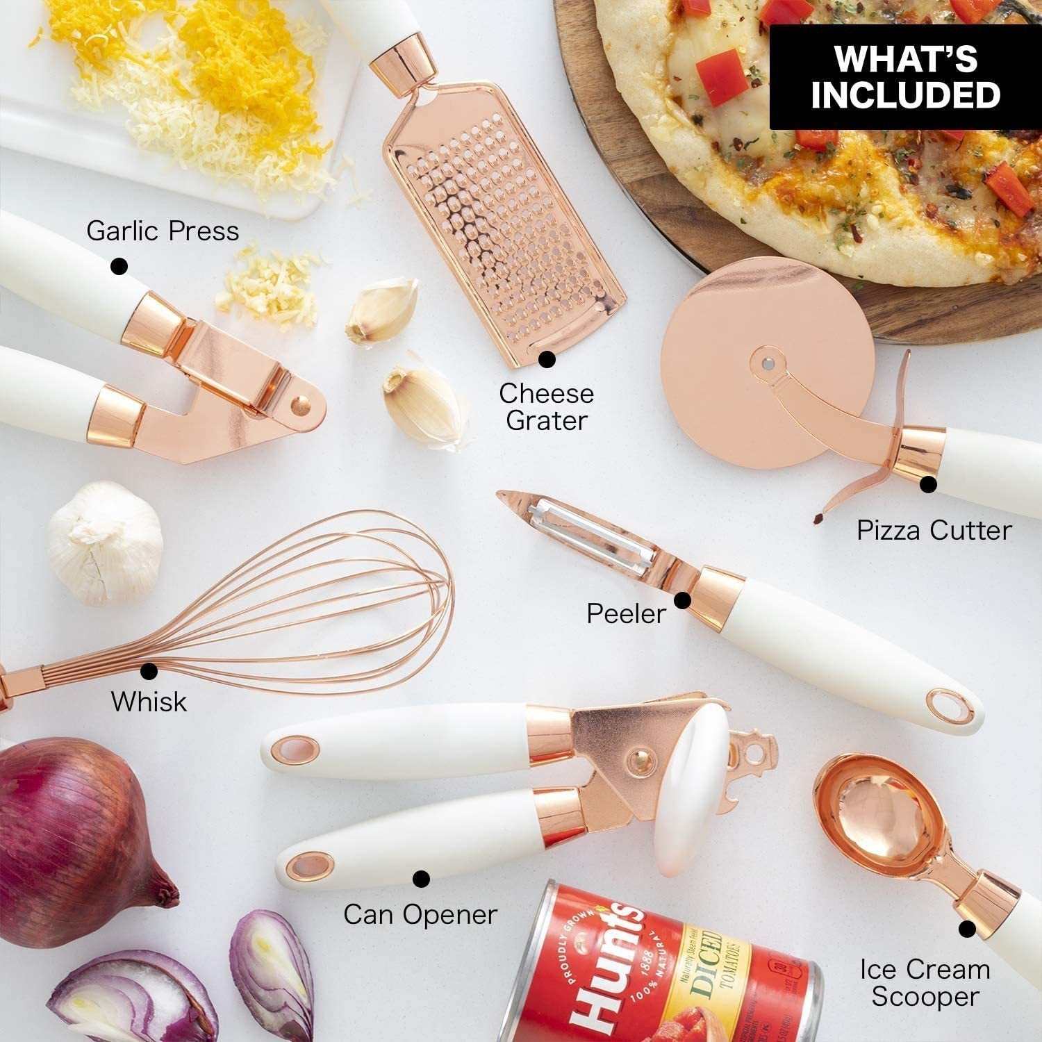 Stainless Steel Kitchen Gadgets 7 Piece Set with peeler, pizza cutter, can opener, cheese grater, whisk, garlic press, and ice cream scooper.
