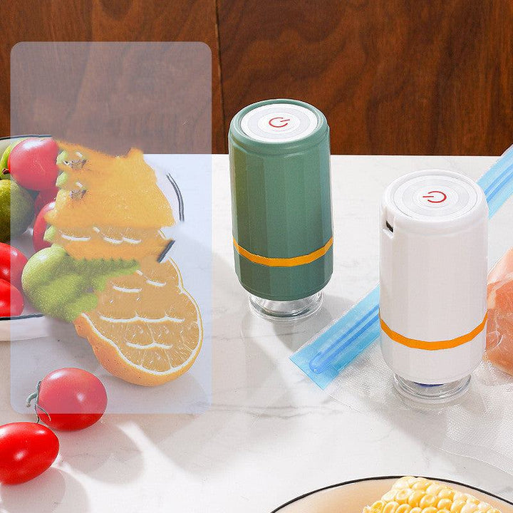 Mini USB charging vacuum sealer in milky white and emerald green, perfect for sous vide and storage.