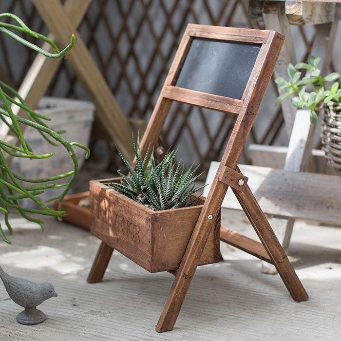 Medium-sized solid wood flower box with blackboard, suitable for garden decorations.