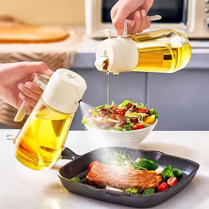 470ML glass olive oil sprayer and dispenser in use for cooking, showcasing dual functionality with both spray and pour action for precise oil application.