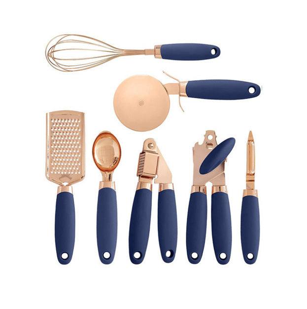 Kitchen household peeler gadget copper plating set with blue handles.
