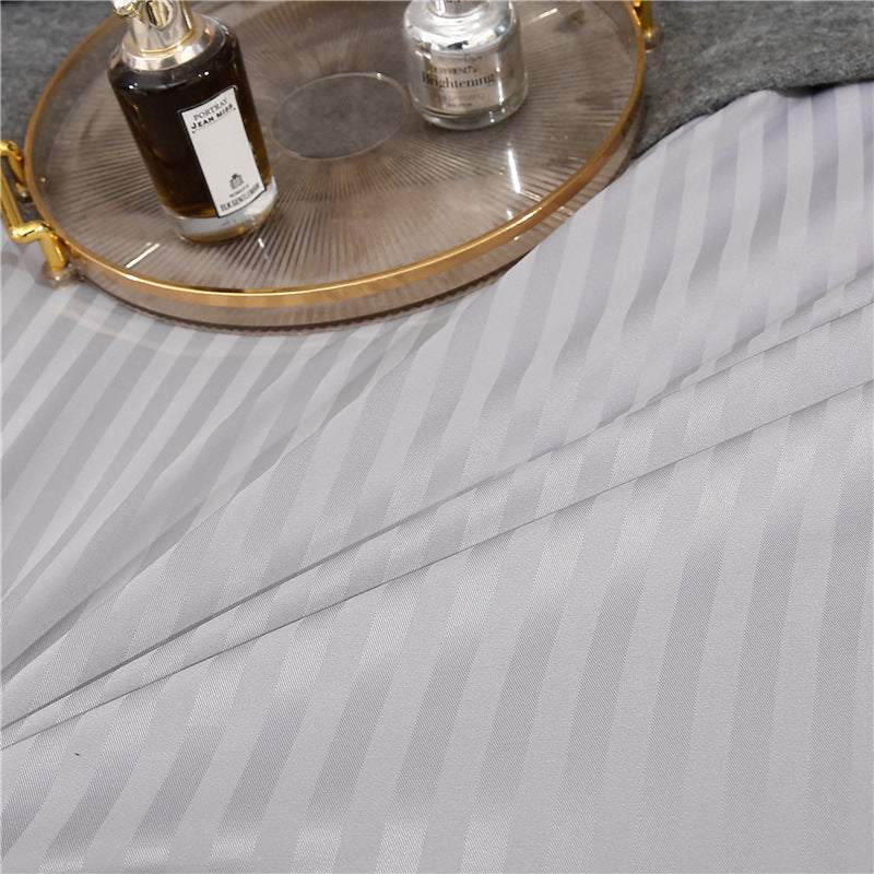 Flower Bedding Set with geometric pattern and satin weave.