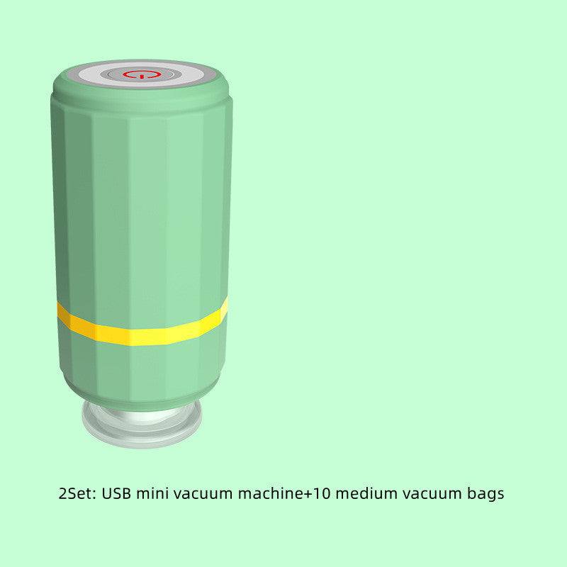 Mini USB charging vacuum sealer in emerald green with 10 medium vacuum bags.