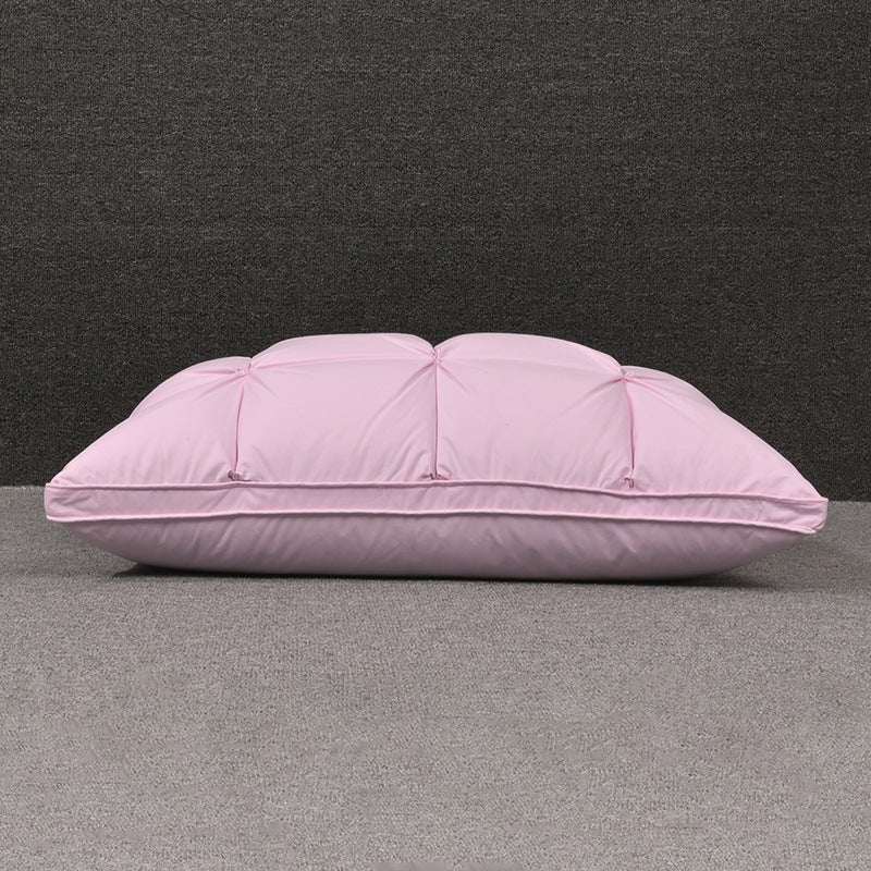 Rectangular white goose down pillow with pink cotton cover on grey background.