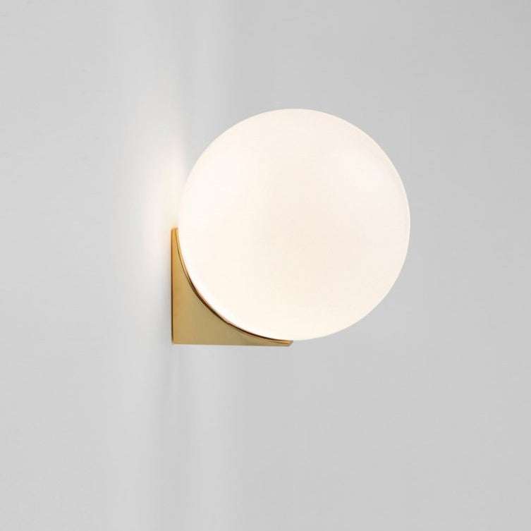 Nordic minimalist wall lamp with a gold finish and glass lampshade.