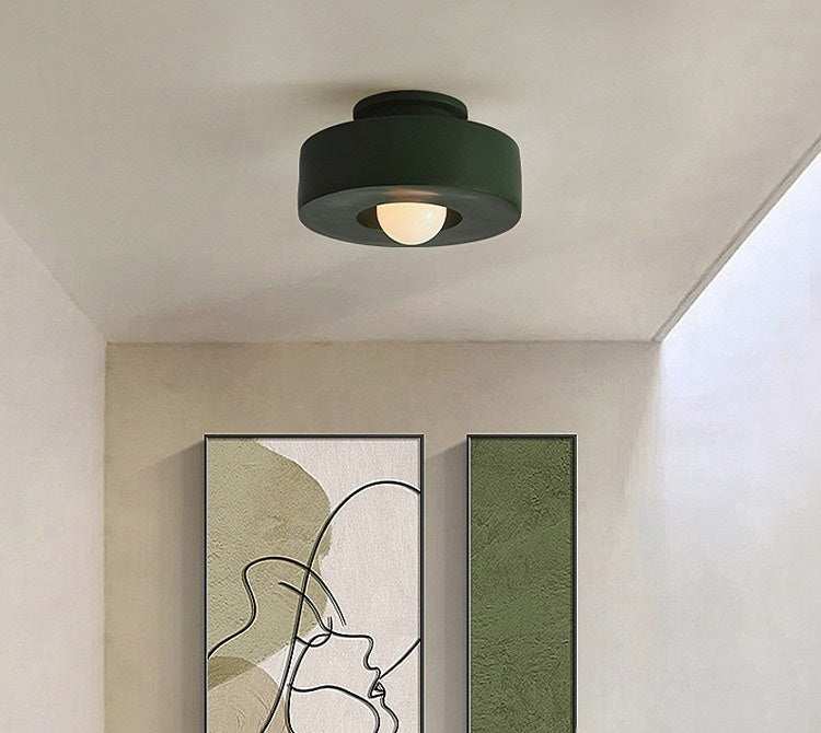Nordic minimalist ceiling light fixture in a modern interior setting.